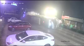 Watch - In a chilling cctv video , luxury bus overturns and slides into parking area