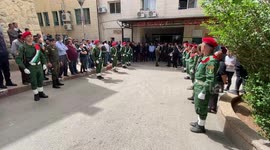 Palestinians carry the body of Mohammed Ghnaim during his funeral in al-Khader village near the West Bank city of Bethlehem