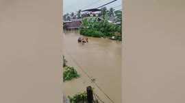 Rain or shine! Activists campaign through FLOOD for Philippines dictator's son