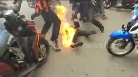A student caught fire while holding a demonstration in Indonesia