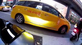 CLOSE CALL: Taxi passenger opens car door into a passing moped rider (Dashcam Video)