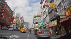 CLOSE CALL: Moped rider reacts just in time as car door opens on them (Dashcam Video)