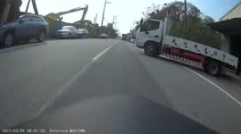 CLOSE CALL: Moped rider was inches away from a potentially fatal collision (Dashcam Video)