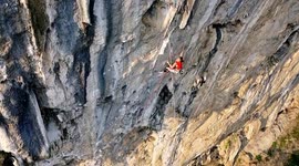 Watch China's youngest rock climber smash record by scaling tough mountainside