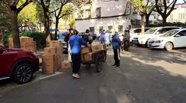 Workers Distribute Free Supplies To Residents in Quarantined Communities in Shanghai, China