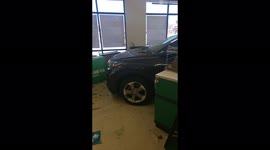 Car crashes intl West Roxbury MA Pet supplies Plus store. Inside the building during the crash