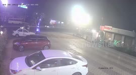 CCTV captures bus overturning on road, crashing into parked cars in western India