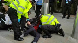 Arrests made as Extinction Rebellion activists glue themselves to Shell HQ