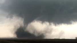 Large tornado churns in fields southwest of Gilmore City, Iowa on April 12, 2022
