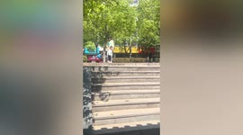 Wholesome moment toddler helps his older autistic sister walk down stairs in China