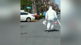 'Go home!' Rollerblading volunteer urges residents to stay indoors during Shanghai's lockdown