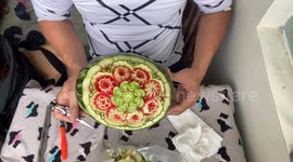 Vietnamese man Man sculpts Nine types of 3D flowers on top of the watermelon