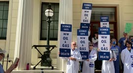 Scientists stage protest outside Charing Cross Police Station in solidarity with activist under arrest