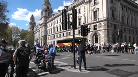 'Rolling Thunder' biker group made up of veterans roll past Downing Street
