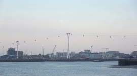 Full Moon Rises Over The Millennium Dome In Londons Docklands