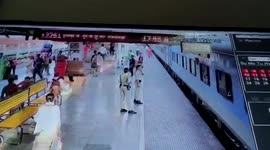 Hero cops save woman from slipping under train in eastern India