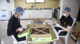 Watch these Palestinian workers make chocolate coated dates during Ramadan