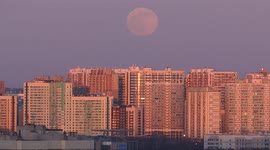 Pink moon appeared on the sunset over the city of St Petersburg  in Russia