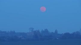 Stunning full 'Pink Moon' seen rising above historic Gatehouse in Kent, UK