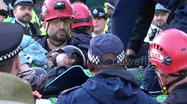 Specialist police team removes climate activists from limousine at Marble Arch in London