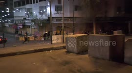 Palestinian protesters clash with Israeli forces in the West Bank city of Hebron