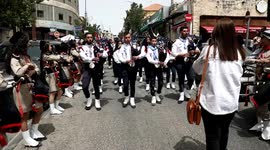 Christian believers and members of the clergy take part in the traditional Catholic Palm Sunday procession