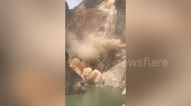 Massive landslide crashes into river in China’s Shangri-La area