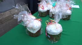 Church cakes and flowers on sale outside Russian Orthodox Church on Palm Sunday - London