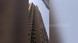 Cars damaged after kids throw objects from window on 33rd floor of building in China