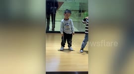 Cute boy almost falls asleep during street dance class in China