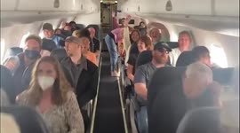 Passengers at LAX celebrate as airlines announce face masks are optional