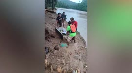 Boy, 11, found alive after hiding overnight in FRIDGE to escape landslide in the Philippines