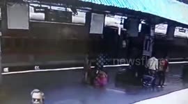 Hero cop saves woman passenger from coming under train in northern India