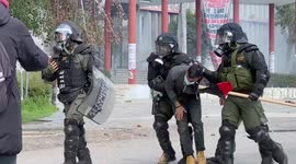 Tear gas and stun grenades used as students clash with Greek police over university eviction