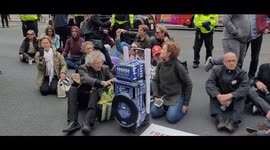 'Get Boris Out' activists have a sit-down protest outside Downing Street