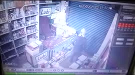 Security cam at Indian hardware store captures bizarre moment thief does victory dance after stealing cash