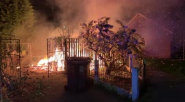 North Wales firefighters battle out of control garden blaze