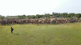Villagers in South India run to get a bounty fish