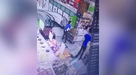 Runaway trolley slams into shopper on escalator in supermarket in Singapore