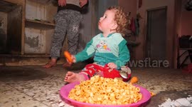 Palestinian woman prepares break-fast iftar meal during Ramadan at the Al Shati refugee camp