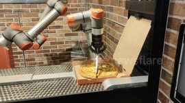 History in the baking: Robot pizza-maker draws huge queues for free slices in Paris