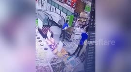 Runaway trolley slams into shopper on escalator in supermarket in Singapore