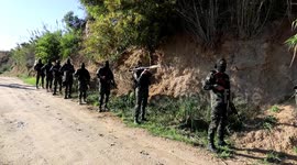 Palestinian militants from armed Islamic Jihad wing stand guard during Ramadan