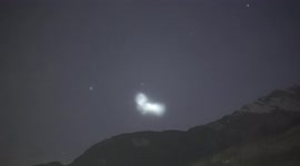 Swiss photographer captures 'angelic' scene as Starlink satellites illuminate night sky