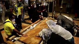 Christians pray at the Church of the Holy Sepulchre