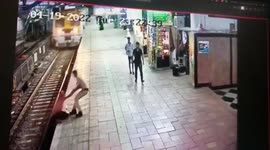 Brave cop saves man from going under moving train in western India