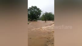 Resident swept away while crossing raging river during Philippines tropical storm Megi