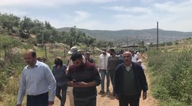 Palestinian protesters clash with Israeli forces following a protest against the expansion of Jewish settlements in the West Bank village of Beit Dajan