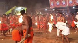 That's lit: Men set each other on FIRE in fascinating religious ritual in southern India