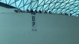 Extinction Rebellion activists hang 'Drop BP' banner in British Museum, London